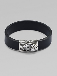 Simply elegant bracelet of smooth leather joined together by a detailed silver clasp.LeatherSilverAbout 3 diam.Lobster claw claspImported Simply elegant bracelet of smooth leather joined together by a detailed silver clasp.LeatherSilverAbout 3 diam.Lobster claw claspImported