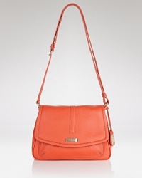 Brighten up your purse portfolio with Cole Haan's crossbody bag. In a crave-worthy hue and classic shape, this bag strikes an enviable balance between trendy and timeless. Brighten up your purse portfolio with Cole Haan's crossbody bag. In a crave-worthy hue and classic shape, this bag strikes an enviable balance between trendy and timeless.
