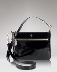 Opt for a on-the-go ease with this versatile crossbody bag from Cole Haan. In patent leather with convertible straps, it shines round the clock. Opt for a on-the-go ease with this versatile crossbody bag from Cole Haan. In patent leather with convertible straps, it shines round the clock.