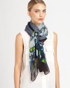 A hand-printed, colorful abstract print adorns a woven scarf.Viscose40 X 74Hand washImported