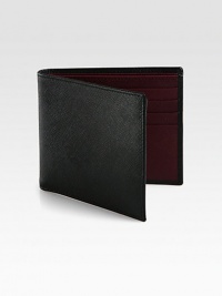 Textured saffiano leather wallet with contrasting interior for modern appeal.Two billfold compartmentsEight card slotsLeather5W x 4HMade in Italy