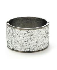 Shimmering and stunning. A silver glitter finish adds a glamorous touch to Haskell's wide bangle bracelet. Crafted in hematite tone mixed metal with a hinge closure. Approximate length: 7-1/2 inches. Shimmering and stunning. A silver glitter finish adds a glamorous touch to Haskell's wide bangle bracelet. Crafted in hematite tone mixed metal with a hinge closure. Approximate length: 7-1/2 inches.