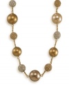 Follow the golden rule with this glamorous illusion necklace. Crafted by Carolee, necklace features gold glass pearls and crystal glass stones. Set in 12k gold-plated mixed metal. Approximate length: 16 inches + 2-inch extender.