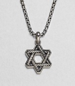 The familiar angles of the Star of David are intricately carved, set in polished sterling silver on a box-chain necklace.Sterling silverbulletNecklace, about 20 longPendant, about 1 wideLobster claspImported