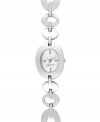 The precision and style of this timepiece from Nine West work in perfect symmetry. Crafted of silver tone mixed metal linked bracelet and oval case. Silver tone dial features tonal applied stick indices, hour and minute hands, sweeping second hand and logo at six o'clock. Quartz movement. Limited lifetime warranty.
