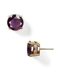 A classic look from kate spade new york -- handcrafted, faceted purple stone earrings in a 12 Kt. gold plated princess setting. A classic look from kate spade new york -- handcrafted, faceted purple stone earrings in a 12 Kt. gold plated princess setting.