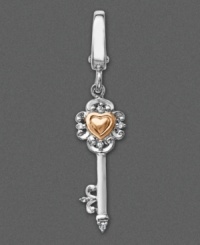 Keep the key to your heart close at hand with this Victorian-inspired sterling silver key charm featuring a 14k gold heart surrounded by shimmering diamond accents. Approximate drop: 1-1/2 inches. Keep the key to your heart close at hand with this Victorian-inspired sterling silver key charm featuring a 14k gold heart surrounded by shimmering diamond accents. Approximate drop: 1-1/2 inches.