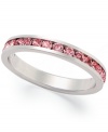 Traditions beautiful stacking ring is perfect when paired with other slim rings, but makes a pretty sparkling statement all its own. Crafted in sterling silver, a thin band features a row of round-cut pink crystals with Swarovski elements. Size 5-10.