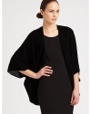 An ultra-plush, velvet-y soft shrug with chic stripes.70% viscose/23% silk/7% polyesterAbout 80 X 115Dry cleanImported