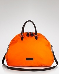 Nylon and leather construct this effortless tote from Liebeskind, secured by a top zipper which opens to a lined interior with 3 pockets. Nylon and leather construct this effortless tote from Liebeskind, secured by a top zipper which opens to a lined interior with 3 pockets.