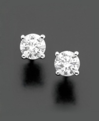 Round our your look with a timeless classic. These stunning diamond stud earrings feature round-cut, near colorless, certified diamonds (1/3 ct. t.w.). Crafted in 14k white gold. Approximate diameter: 3-4/10 mm. Round our your look with a timeless classic. These stunning diamond stud earrings feature round-cut, near colorless, certified diamonds (1/3 ct. t.w.). Crafted in 14k white gold. Approximate diameter: 3-4/10 mm.