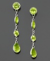 Perfect for daytime glam or evening glow, these 14k white gold earrings feature round- and marquise-cut peridot (3-5/8 ct. t.w.). Approximate drop: 1-1/4 inches.