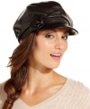Get your shine on with this updated newsbody from Nine West that's more rocker-chic than special delivery.  A flirty flower accents the brim for feminine appeal.