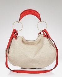 Linen and leather prove a chic combination on this slouchy hobo from Sequoia, sure to add natural wonder to your day-to-day looks. Linen and leather prove a chic combination on this slouchy hobo from Sequoia, sure to add natural wonder to your day-to-day looks.