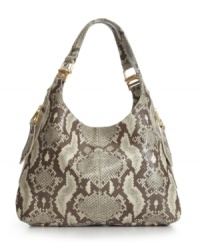 Sleek and sophisticated with a daring edge. Python printed leather covers this gorgeous Calvin Klein design for a thrilling yet refined allure that will spark some bag envy. Sleek and sophisticated with a daring edge. Python printed leather covers this gorgeous Calvin Klein design for a thrilling yet refined allure that will spark some bag envy.