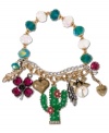 An oasis of cute charms. Betsey Johnson's bracelet highlights gold and silver tone chains, clear/green faceted bead stretch chain, green cactus with crystal accents, pink flowers, fuchsia-colored crystal accent, four-leaf clover, gold tone bubble heart, gold and silver tone feathers, and gold tone bow with clear faceted bead accent. Set in gold tone mixed metal. Approximate length: 7-1/2 inches. Approximate drop: 1-3/4 inches.