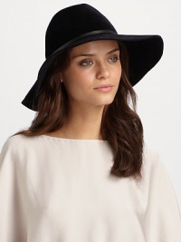 Asymmetric wide brim hat with leather and metallic O'Ring trim.Adjustable inner band One size fits most Brim, about 4 Rabbit hair Imported Please note: Sold with brush to maintain pile. 