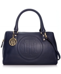 Preppy, posh and poised to meet your daily demands, this signature leather satchel from Tommy Hilfiger is the perfect piece. Logo-embossed with gleaming hardware, the spacious design stows everything from eReader to opera tickets. Preppy, posh and poised to meet your daily demands, this signature leather satchel from Tommy Hilfiger is the perfect piece. Logo-embossed with gleaming hardware, the spacious design stows everything from eReader to opera tickets.