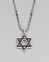 Black diamonds trace the familiar angles of the Star of David, cast in polished sterling silver on a box-chain necklace. From the Black Diamond Collection Sterling silver Black diamonds, 1.14 tcw Chain length, about 22 Lobster clasp Imported 
