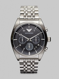 Sleek and shiny stainless steel bracelet is accented with a textured dial with chronograph functionality.Round bezelQuartz movementWater resistant to 5ATMDate function at 4Stainless steel case: 43mm (1.69)Stainless steel braceletSecond handImported