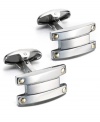 Industrial chic. These unique bar-shaped cuff links feature a sterling silver setting with 18k gold accents. Approximate length: 7/8 inch. Approximate width: 1/2 inch.