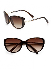 Classic cat's-eye design with logo detail at hinge. Available in havana with brown gradient lens, ice with green gradient lens or black with grey gradient lens.AcetateMetal templeSpring hingeUV400 lensMade in Italy Classic cat's-eye design with logo detail at hinge. Available in havana with brown gradient lens, ice with green gradient lens or black with grey gradient lens.AcetateMetal templeSpring hingeUV400 lensMade in Italy