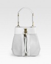 A chic, structured silhouette with goldtone hardware and bold zip details.Detachable top handle, 7 dropClasp and zipper closureProtective metal feetOne inner zip pouchFully lined10W X 10H X 6DImported