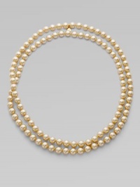 Endless pearl strand that is simply elegant. 10mm organic man-made pearls 48 long Imported Endless pearl strand that is simply elegant. 10mm organic man-made pearls 48 long Imported