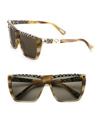 Slither into a statement style with this snake-print leather accented resin design. Available in shiny horn with brown lens or shiny bordeaux with brown gradient lens. Snake-printed leather accented rims and temples100% UV protectionMade in Italy Slither into a statement style with this snake-print leather accented resin design. Available in shiny horn with brown lens or shiny bordeaux with brown gradient lens. Snake-printed leather accented rims and temples100% UV protectionMade in Italy