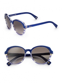 A fun, striped design in lightweight acetate. Available in blue crystal with grey gradient lens or striped yellow with brown gradient lens. Logo temples100% UV protectionMade in Italy A fun, striped design in lightweight acetate. Available in blue crystal with grey gradient lens or striped yellow with brown gradient lens. Logo temples100% UV protectionMade in Italy
