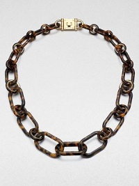 Make a statement with this tortoise-pattern acetate chain link design. Tortoise-pattern acetateGoldtone brassLength, about 34Turn-lock closureImported Make a statement with this tortoise-pattern acetate chain link design. Tortoise-pattern acetateGoldtone brassLength, about 34Turn-lock closureImported