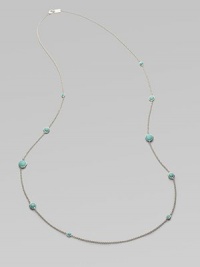 From the Silver Wonderland Collection. A long, lovely sterling silver chain is brightly dotted with faceted turquoise in an array of sizes. Turquoise Sterling silver Length, about 38 Lobster clasp Imported From the Silver Wonderland Collection. A long, lovely sterling silver chain is brightly dotted with faceted turquoise in an array of sizes. Turquoise Sterling silver Length, about 38 Lobster clasp Imported