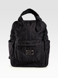 Shoulder your essentials in this roomy nylon bag finished with signature letter stitching and multiple pockets to keep you organized.Top handles, 5½ dropAdjustable backpack straps, 8-12 dropTwo outside open pocketsOne inside zip pocketNylon lining11¼W X 15¾H X 6½DImported Shoulder your essentials in this roomy nylon bag finished with signature letter stitching and multiple pockets to keep you organized.Top handles, 5½ dropAdjustable backpack straps, 8-12 dropTwo outside open pocketsOne inside zip pocketNylon lining11¼W X 15¾H X 6½DImported