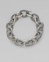Bold, chunky links, alternating between smooth and cabled, create a bracelet that's both classic and of-the-moment with true Yurman style. Sterling silver Length, about 7½ Spring ring clasp Made in Italy
