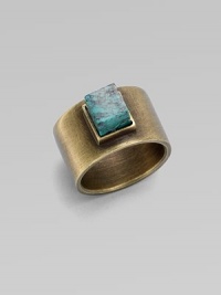 A structural piece with a square, center turquoise stone. TurquoiseBrassWidth, about ½Made in USA