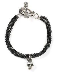 Break with conventional accessories. This hard-hitting sterling silver and spinel bracelet from Queen Baby is equal parts edgy and glamorous, accented by a sterling silver skull charm. Break with conventional accessories. This hard-hitting sterling silver and spinel bracelet from Queen Baby is equal parts edgy and glamorous, accented by a sterling silver skull charm.