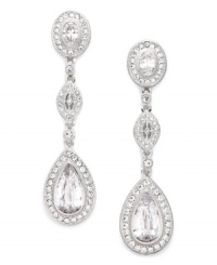 Refined glamour. Eliot Danori's dazzling drop earrings will catch the light with round, pear, and marquise-cut cubic zirconias (10-7/8 ct. t.w.) set in silver tone mixed metal. Approximate drop: 2-1/8 inches. Refined glamour. Eliot Danori's dazzling drop earrings will catch the light with round, pear, and marquise-cut cubic zirconias (10-7/8 ct. t.w.) set in silver tone mixed metal. Approximate drop: 2-1/8 inches.