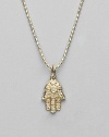 The open hand, a traditional symbol of protection, set with pavé diamonds and a diamond center on a 14k yellow gold ball chain. Diamonds, 0.05 tcw 14k yellow gold Chain length, about 16 Pendant, about ½L x ¼W Lobster clasp Imported