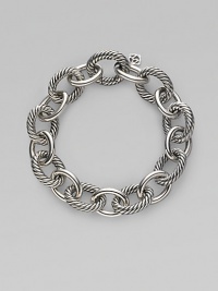 Bold, chunky links, alternating between smooth and cabled, create a bracelet that's both classic and of-the-moment with true Yurman style. Sterling silver Length, about 7½ Spring ring clasp Made in Italy Bold, chunky links, alternating between smooth and cabled, create a bracelet that's both classic and of-the-moment with true Yurman style. Sterling silver Length, about 7½ Spring ring clasp Made in Italy
