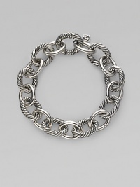 Bold, chunky links, alternating between smooth and cabled, create a bracelet that's both classic and of-the-moment with true Yurman style. Sterling silver Length, about 7½ Spring ring clasp Made in Italy