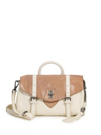 THE LOOKRectangular silhouetteRounded leather top handle & removable, adjustable crossbody strapTop flap closure with scored barrel turn-lockOutside buckled strap detailProtective metal feetTasseled chain with logo hardwareOne inside zip pocketTwo inside open pocketsLogo plaque on insideTHE FITTop handle, 3½ dropCrossbody strap THE LOOKRectangular silhouetteRounded leather top handle & removable, adjustable crossbody strapTop flap closure with scored barrel turn-lockOutside buckled strap detailProtective metal feetTasseled chain with logo hardwareOne inside zip pocketTwo inside open pocketsLogo plaque on insideTHE FITTop handle, 3½ dropCrossbody strap