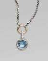 A richly faceted blue topaz in a graceful cable frame makes an elegant addition to your own necklace or bracelet. Blue topaz Sterling silver Diameter, about ½ Spring clip clasp Made in USA Please note: Necklace sold separately.