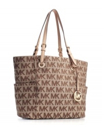 A chic, polished Signature tote from MICHAEL Michael Kors that works day or night, corporate or casual. A chic, polished Signature tote from MICHAEL Michael Kors that works day or night, corporate or casual.