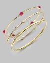 From the Rock Candy® Collection. A delicately crafted piece with five ruby cabochon stations to create a wonderfully unique style. 18k goldRuby cabochonsSlip-on styleDiameter, about 2¾Imported 