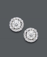 Style fit for a star. Wear this sparkling pair for any occasion, but be prepared to turn heads. Round-cut diamonds (1 ct. t.w.) shine amongst a halo of diamond accents. Crafted in 14k white gold. Approximate diameter: 7-1/2 mm. Style fit for a star. Wear this sparkling pair for any occasion, but be prepared to turn heads. Round-cut diamonds (1 ct. t.w.) shine amongst a halo of diamond accents. Crafted in 14k white gold. Approximate diameter: 7-1/2 mm.