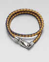 A richly-hued braided leather bracelet perfect for layering and wrap around styling.LeatherAbout 3 diam.Spring claspMade in Italy