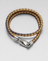 A richly-hued braided leather bracelet perfect for layering and wrap around styling.LeatherAbout 3 diam.Spring claspMade in Italy