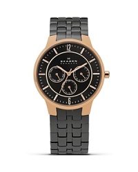 From dusk till dawn, this stainless steel watch from Skagen is the ultimate in sleek, modern design, boasting advanced Japanese quartz movement. Wear it for supreme round the clock style. From dusk till dawn, this stainless steel watch from Skagen is the ultimate in sleek, modern design, boasting advanced Japanese quartz movement. Wear it for supreme round the clock style.