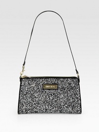 A sparkling, glitter design trimmed in glossy patent leather, perfect for you essentials.Convertible shoulder strap, 9 dropTop zip closureOne inside open pocketSatin lining9W X 5½H X 1½DMade in Italy A sparkling, glitter design trimmed in glossy patent leather, perfect for you essentials.Convertible shoulder strap, 9 dropTop zip closureOne inside open pocketSatin lining9W X 5½H X 1½DMade in Italy