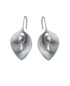 For days in the sun and sand, these summery shell earrings by Breil are beach-perfect. Crafted from polished stainless steel, shell-shaped drops highlight pink natural pearls. Approximate drop: 1 inch.